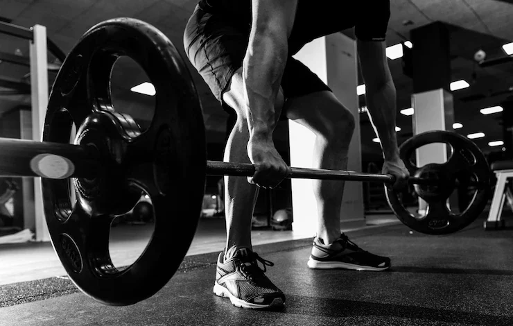 Pesos del ejercicio de pesas fuerte atlética
